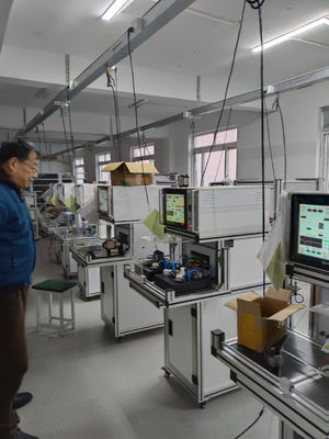 Mesin pengujian stator motor DC dengan perlengkapan pneumatik